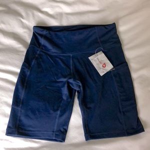 NEW Baleaf blue exercise shorts. Pockets both side